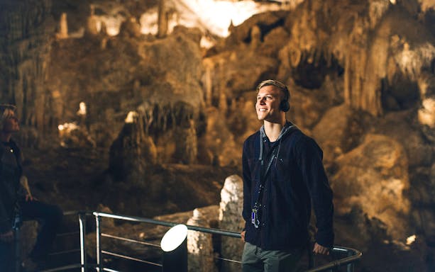 Visitor enjoying Mammoth Cave Margaret River self-guided audio tour.