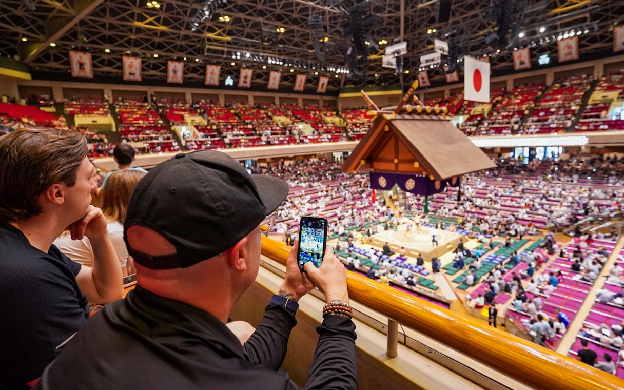 Spectators watching a sumo match at Ryogoku Kokugikan in Tokyo.
