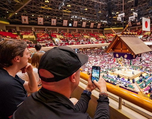 Spectators watching a sumo match at Ryogoku Kokugikan in Tokyo.