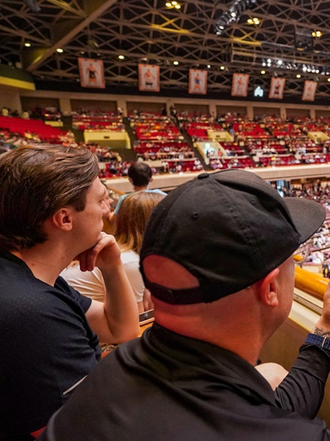 Spectators watching a sumo match at Ryogoku Kokugikan in Tokyo.