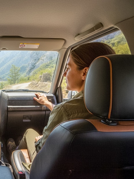4x4 vehicle interior with Bovilla Lake view through windshield during offroad tour.