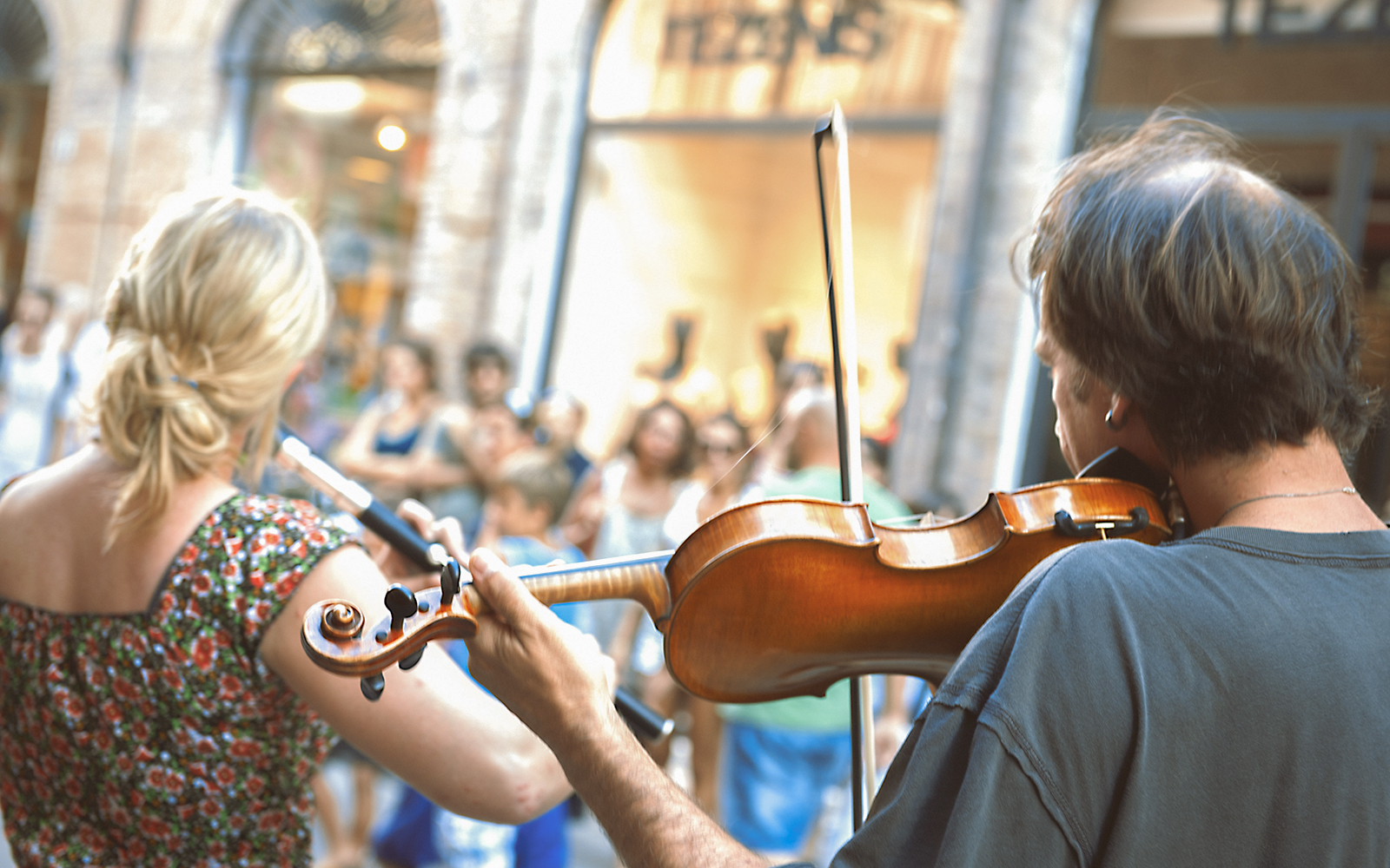 Performers of street artists violinist at Santo Stefano