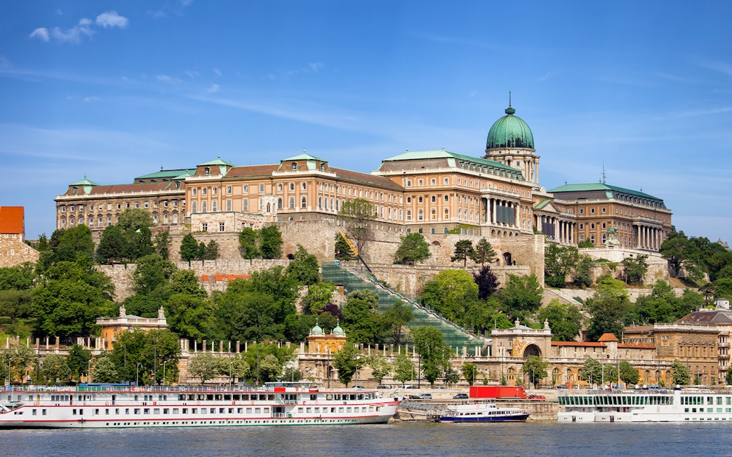 Buda Castle viewed from Danube River during Budapest sightseeing cruise.