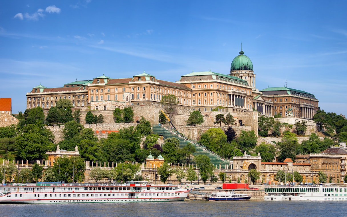 Buda Castle viewed from Danube River during Budapest sightseeing cruise.