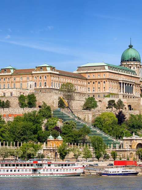 Buda Castle viewed from Danube River during Budapest sightseeing cruise.