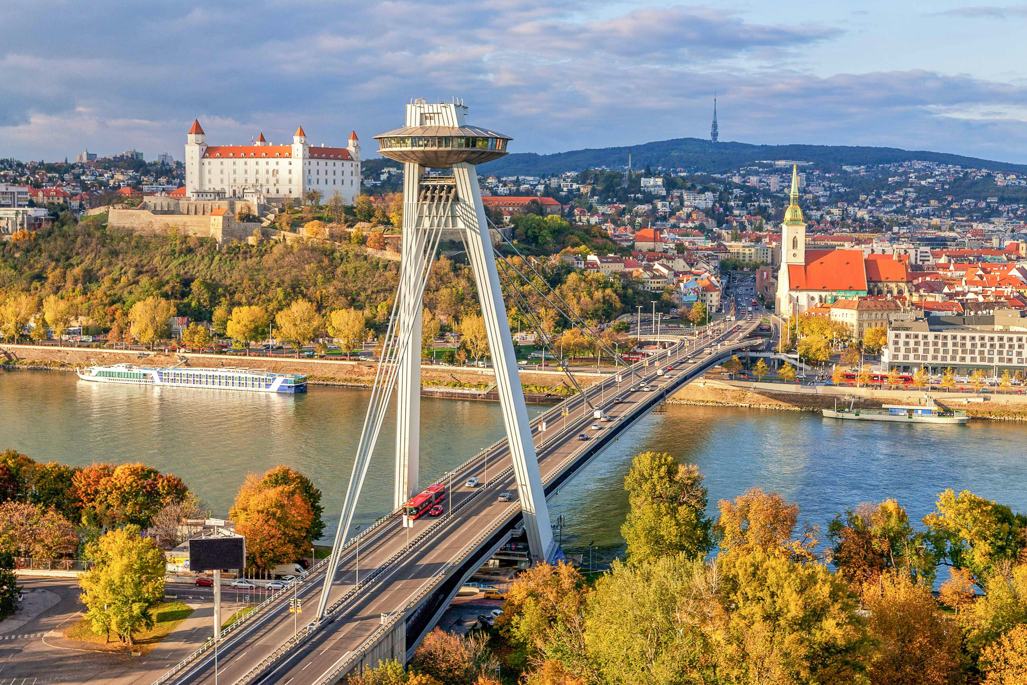 UFO Bridge and Bratislava Castle over the Danube River in Bratislava.