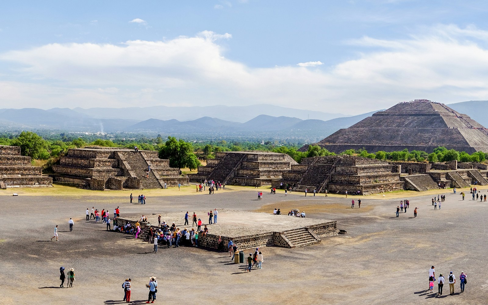 Avenue of the Dead with tourists, overlooking Pyramid of the Sun, Teotihuacan, Mexico.