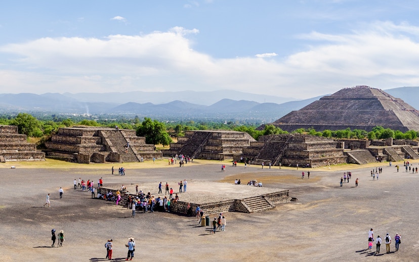 Avenue of the Dead with tourists, overlooking Pyramid of the Sun, Teotihuacan, Mexico.