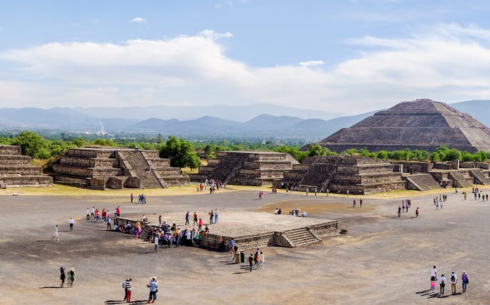 Avenue of the Dead with tourists, overlooking Pyramid of the Sun, Teotihuacan, Mexico.