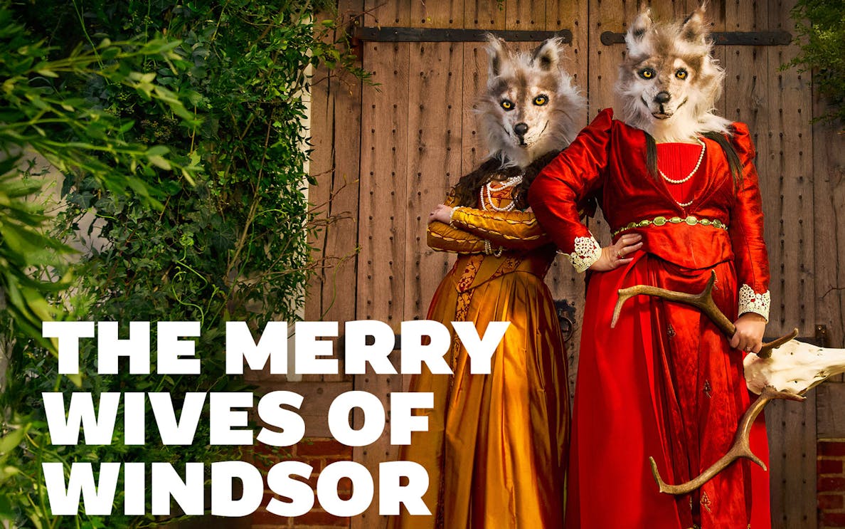 Two people in wolf masks and period costumes for The Merry Wives of Windsor.