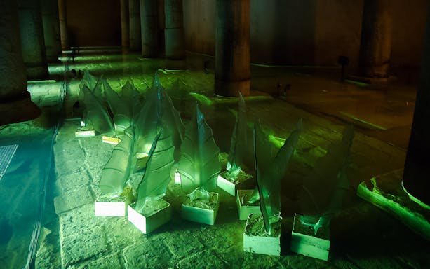 Glass sculptures illuminated in the Basilica Cistern interior, Istanbul.
