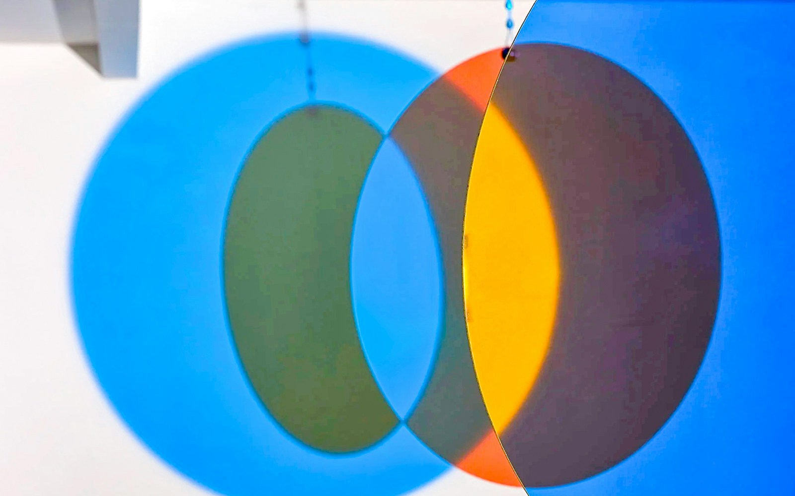 Colorful overlapping circles exhibit at Light Art Museum.