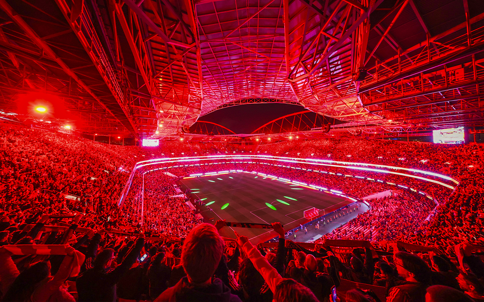 Benfica Stadium illuminated in red during a match light show, Lisbon, Portugal.