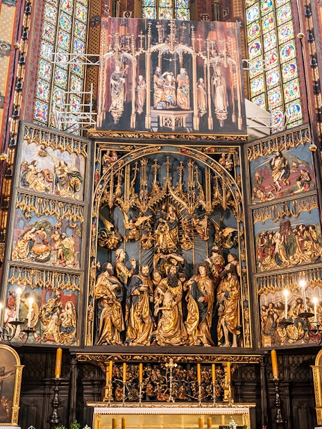 St. Mary’s Basilica interior with ornate altarpiece, Kraków guided tour.