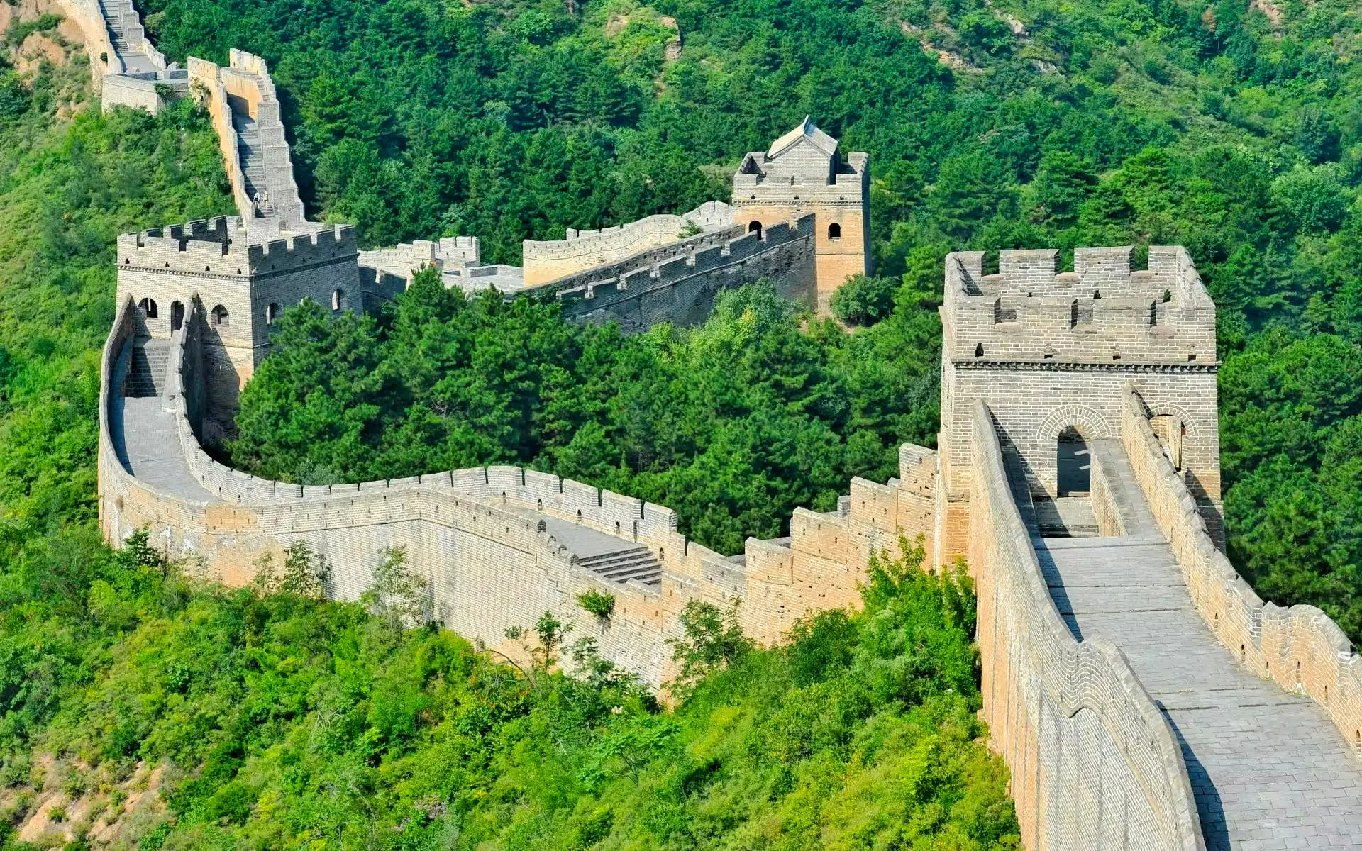 Mutianyu Great Wall section with watchtowers and lush greenery, Huairou District, Beijing.