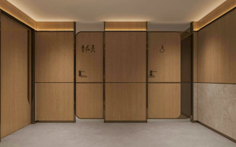 Restroom entrances at Shanghai Pudong International Airport Terminal 2 with accessibility signs.