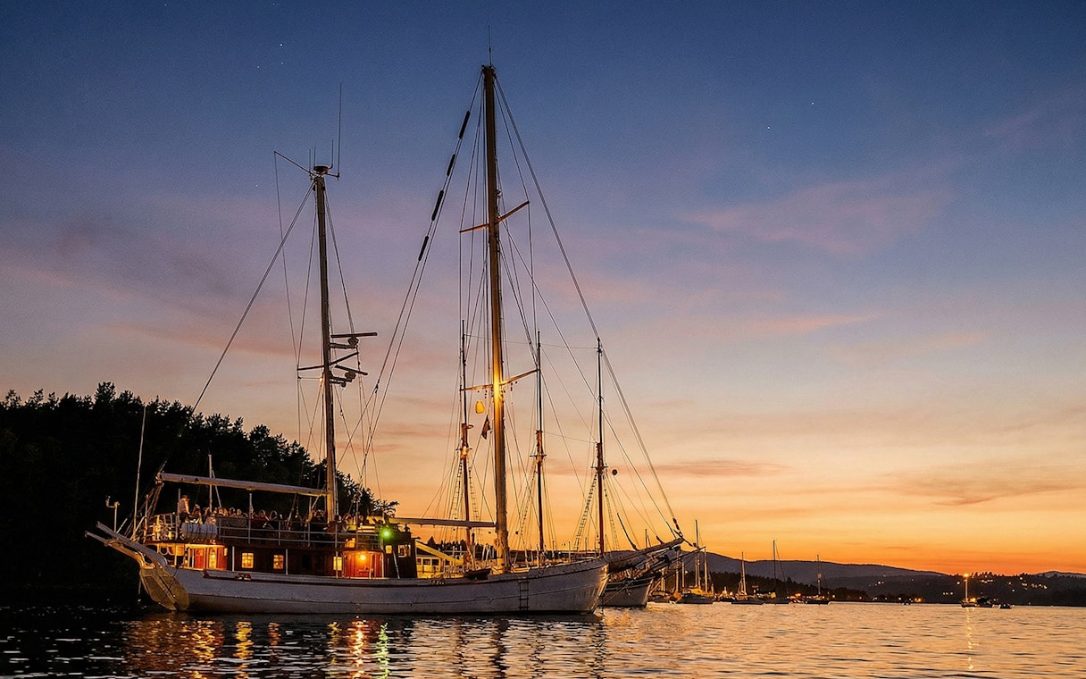 Sailing ship on Oslofjord during evening seafood dinner cruise.