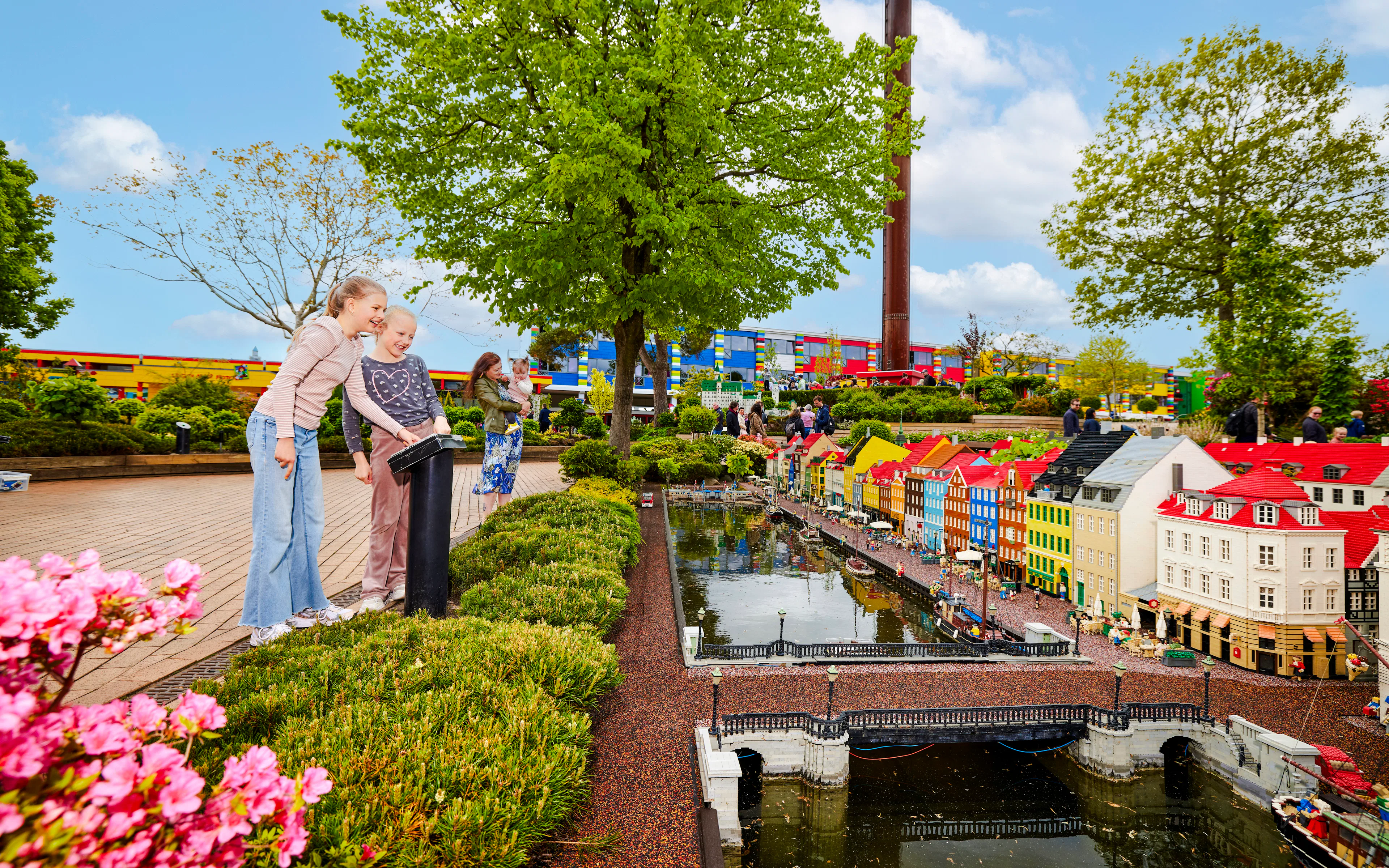 Kids exploring LEGO model buildings at LEGOLAND Billund.
