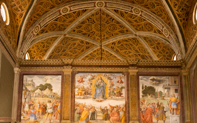 Interior of Church of San Maurizio, Milan, with frescoes and detailed architecture.