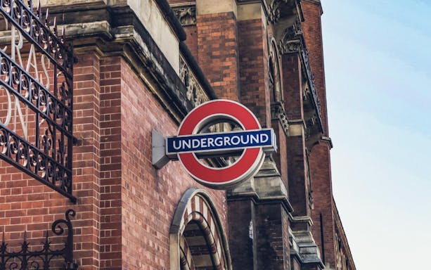 London Underground sign on a brick building near the London Transport Museum.