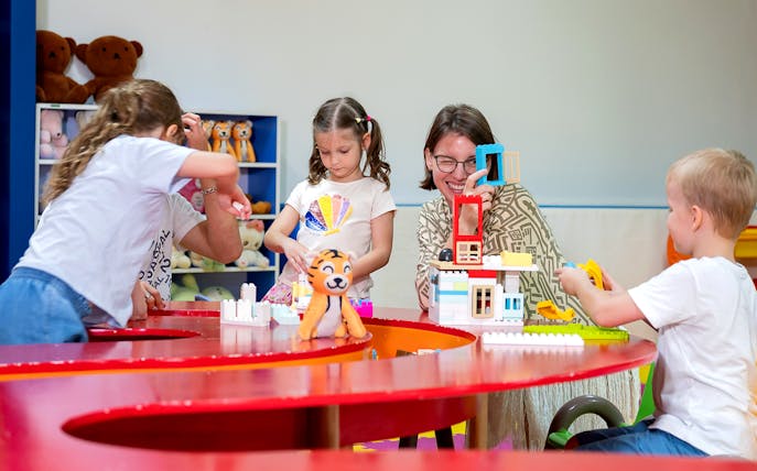 Children playing with building blocks at Rawai Kids Park.