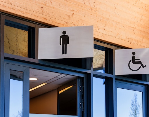 Accessible restrooms with clear signage at a tourist attraction.