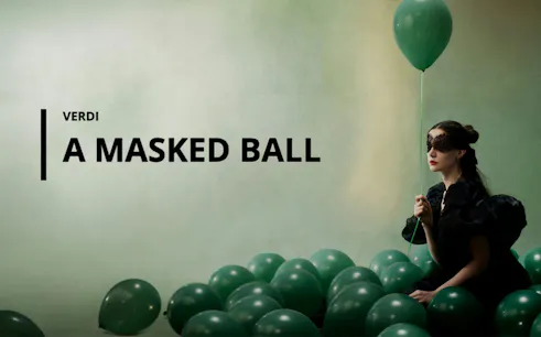 Verdi's A Masked Ball opera poster with masked woman and green balloons, Sydney.