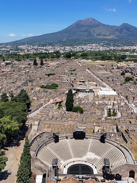 Aerial view of Pompeii Ruins with Mount Vesuvius in the background, Naples.