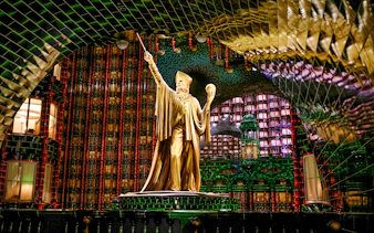 Golden statue in the Ministry of Magic at Epic Universe, Universal Orlando.
