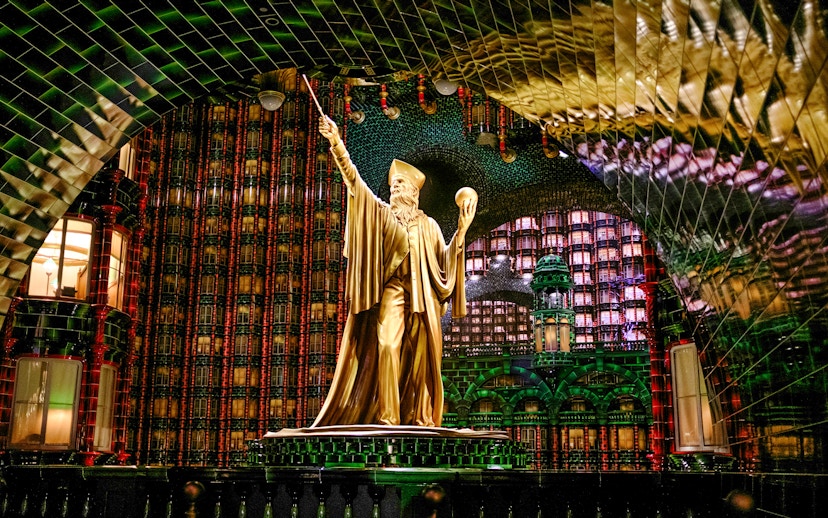 Golden statue in the Ministry of Magic at Epic Universe, Universal Orlando.