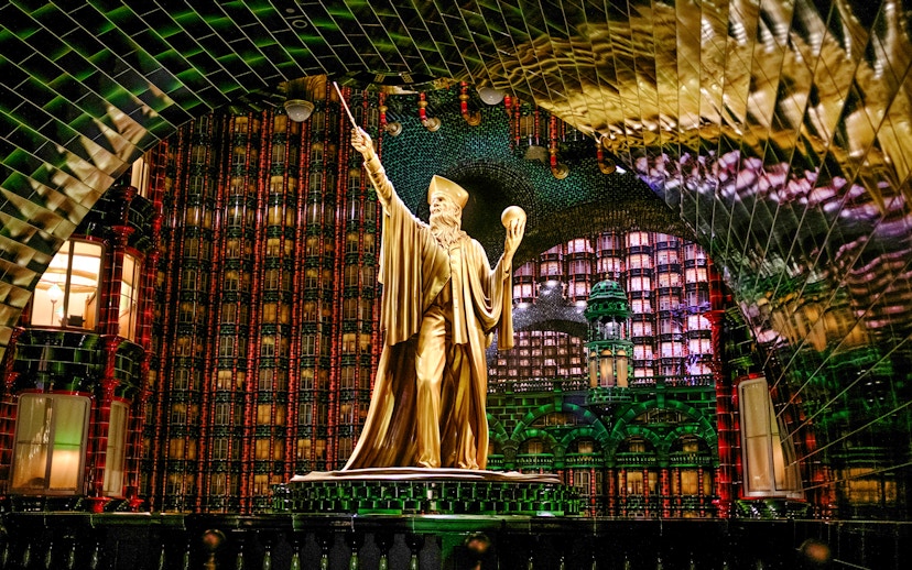 Golden statue in the Ministry of Magic at Epic Universe, Universal Orlando.