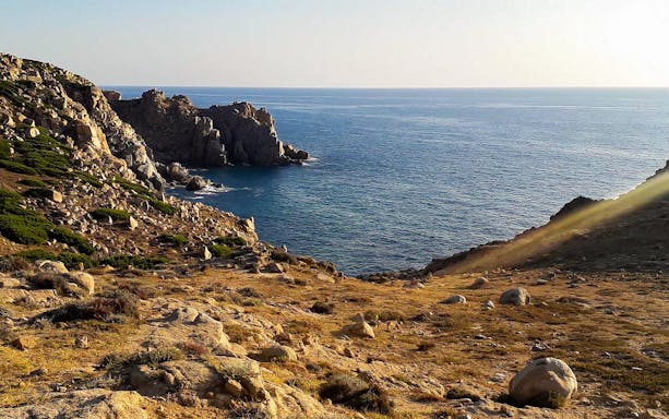 Rocky coastal landscape of Manago Stone Garden with ocean view.