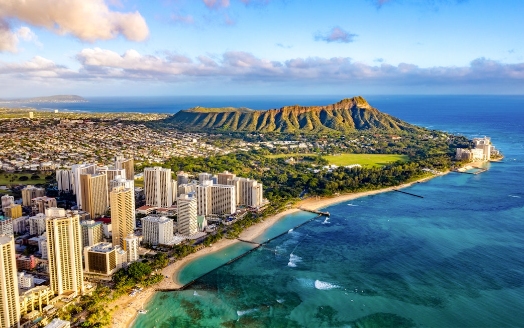 Waikiki skyline with Diamond Head and Queen Kapiolani Regional Park in Honolulu, Hawaii.