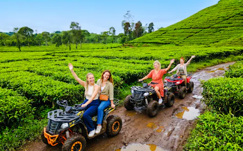 ATV riders exploring tea plantation in Bandung, Indonesia.
