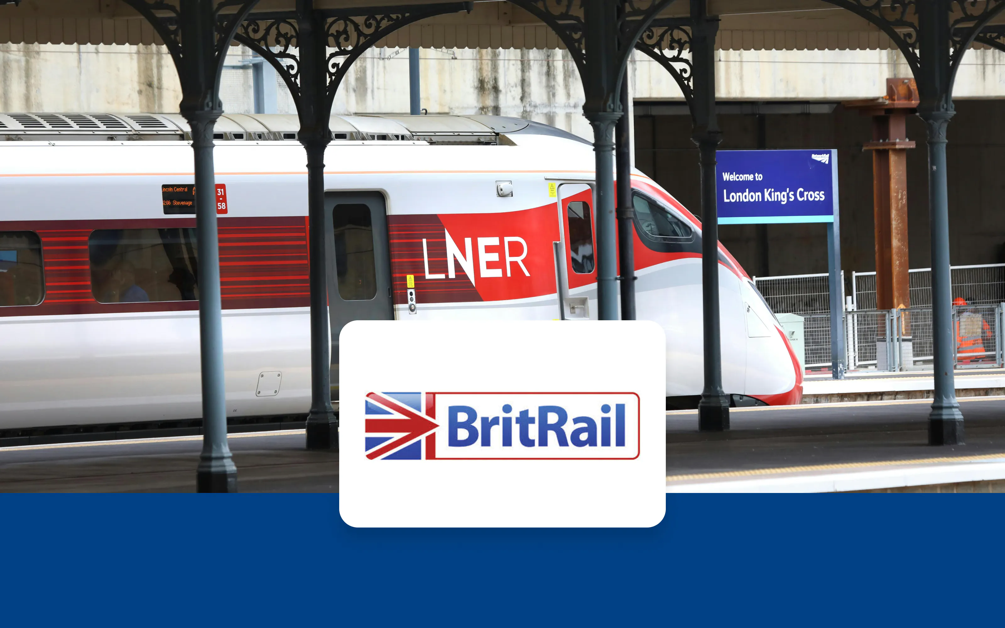 Train at London King's Cross station with BritRail logo.