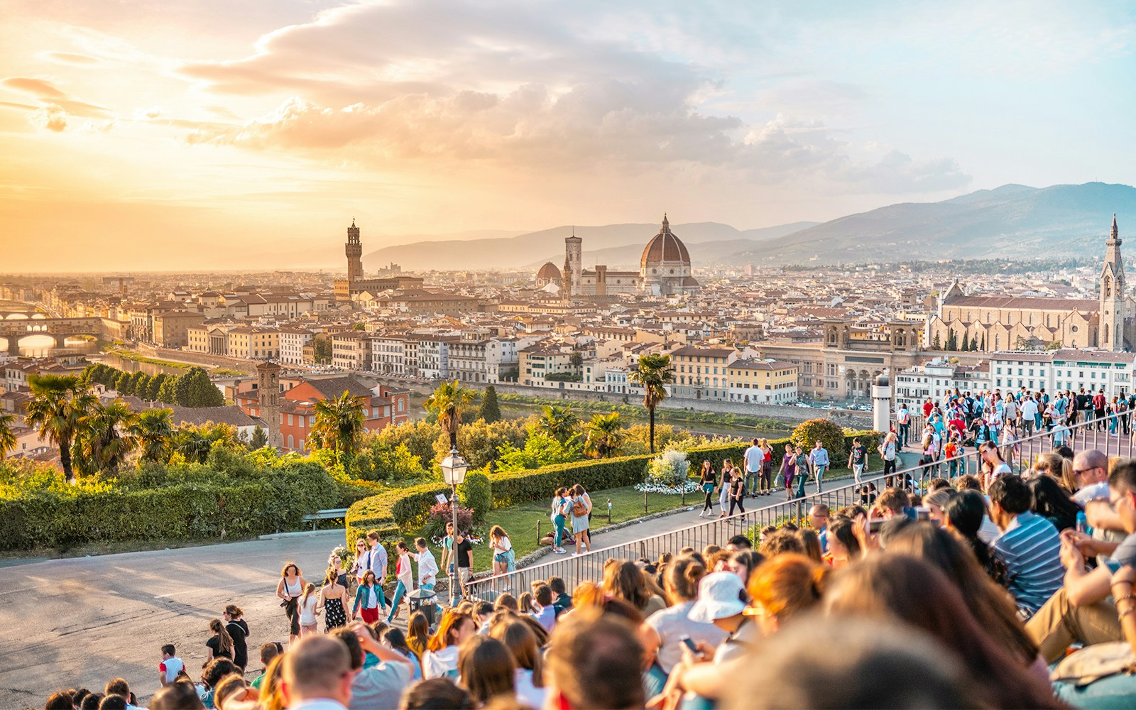 View of Florence skyline from Piazzale Michelangelo, featuring the iconic Duomo and Arno River.