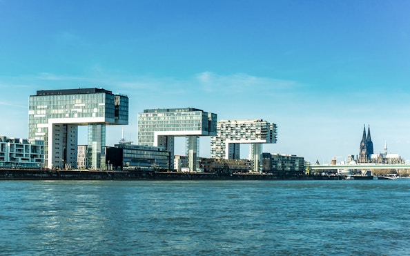 Kranhäuser buildings and Cologne Cathedral viewed from the Rhine River.