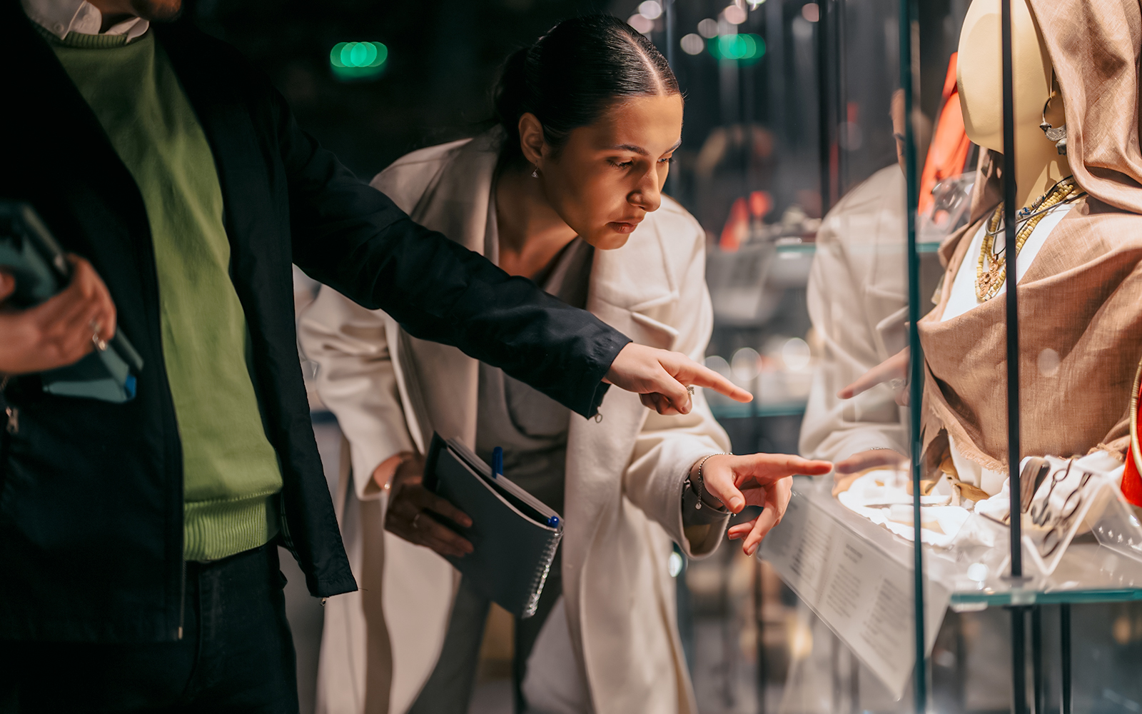 Visitors examining exhibits at Fondation Azzedine Alaïa in Paris, France.