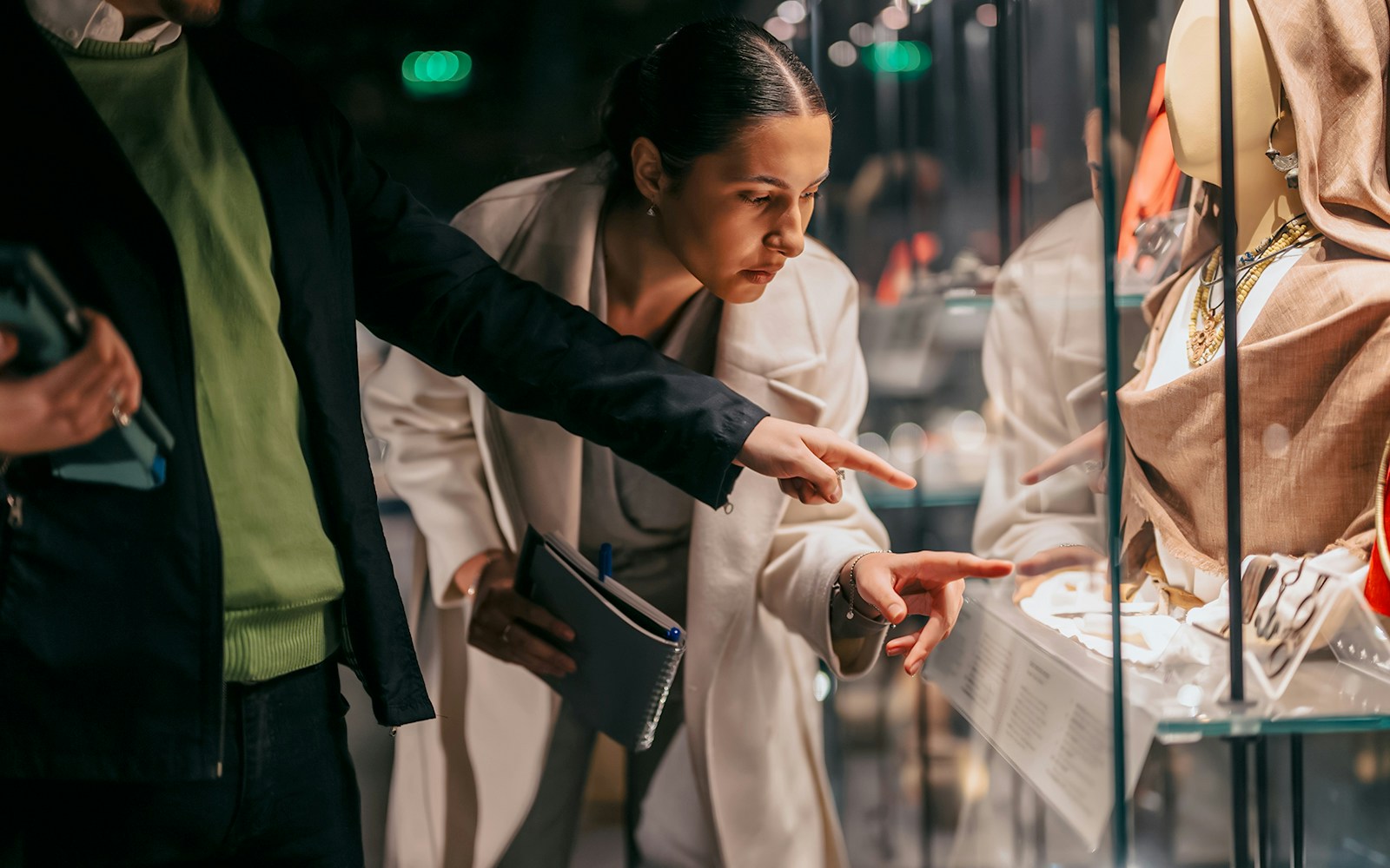 Visitors examining exhibits at Fondation Azzedine Alaïa in Paris, France.