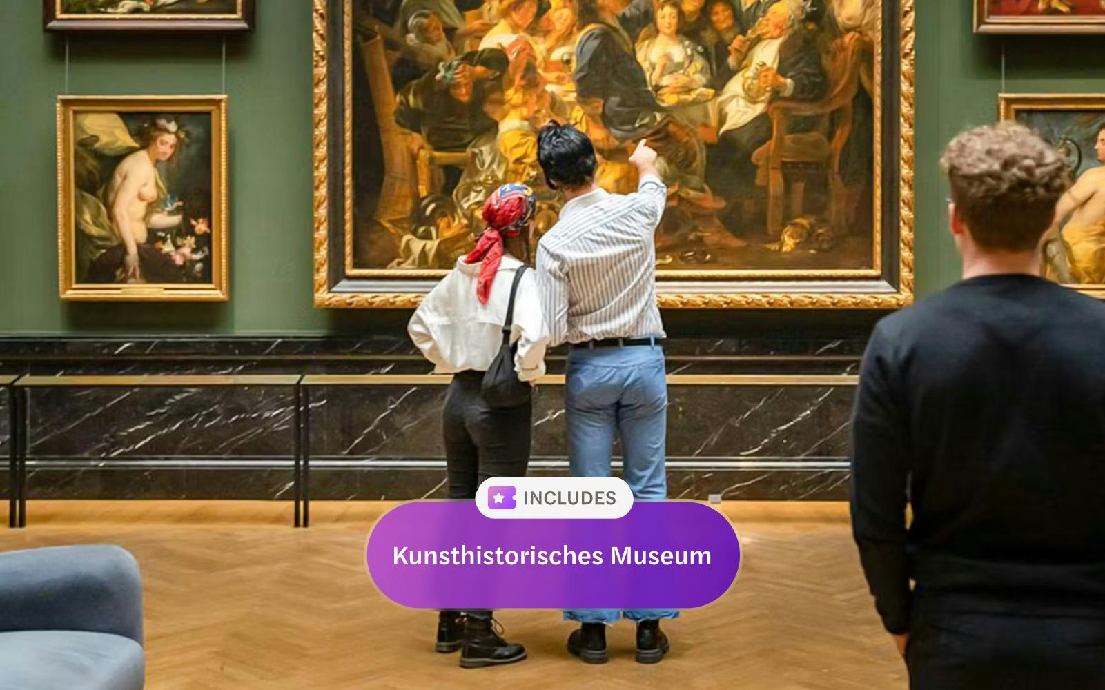Guests viewing paintings inside Kunsthistorisches Museum Vienna.
