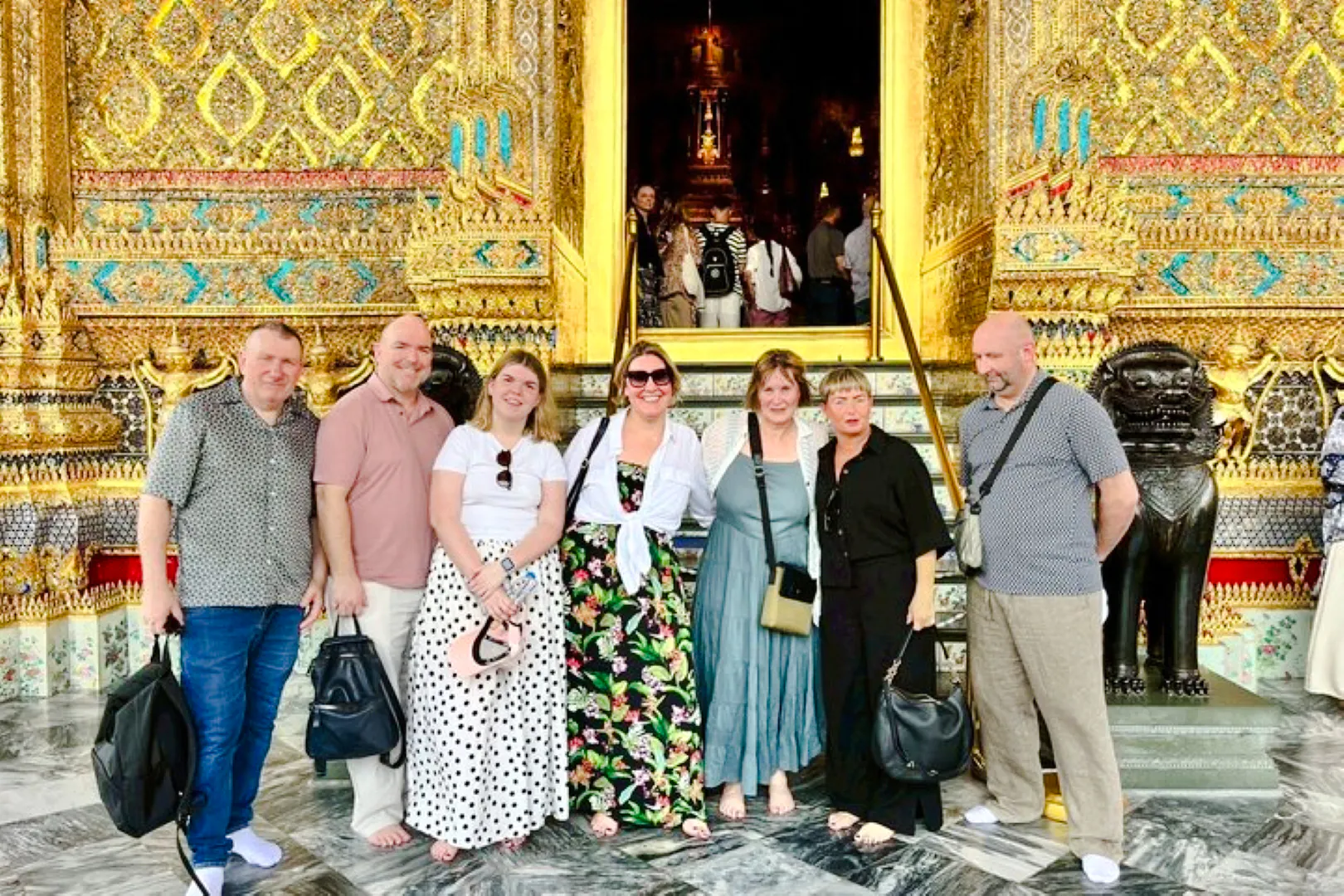 Group of tourists at the entrance of the Grand Palace, Bangkok, during a private tour.
