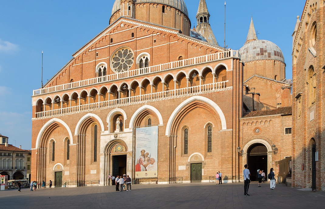 Basilica of Saint Anthony in Padua, Italy, with visitors outside, part of guided walking tour.