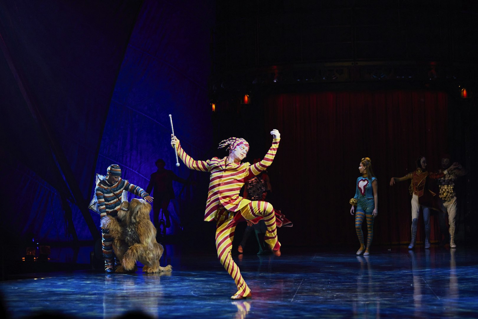 Performer in colorful costume during Kooza stage show in Brisbane.
