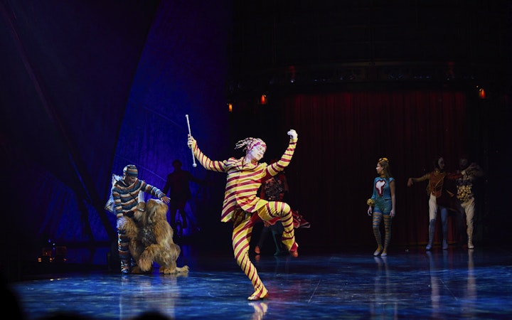 Performer in colorful costume during Kooza stage show in Brisbane.