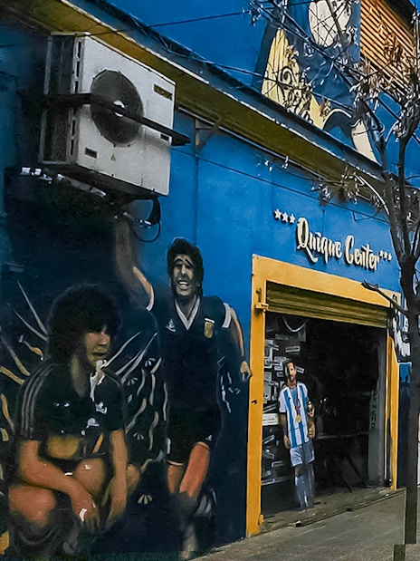 Street art and murals outside La Bombonera stadium in Buenos Aires.