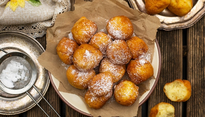 Frittelle pastries on a plate