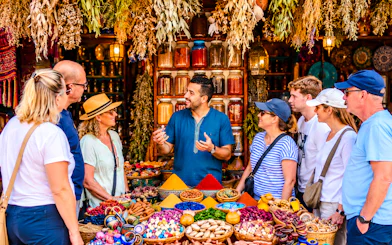 Group exploring spice market during Tangier walking tour.