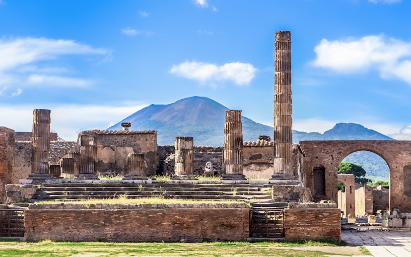 Ruins of Pompeii with Mount Vesuvius in the background.