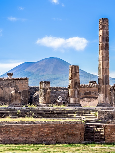 Ruins of Pompeii with Mount Vesuvius in the background.