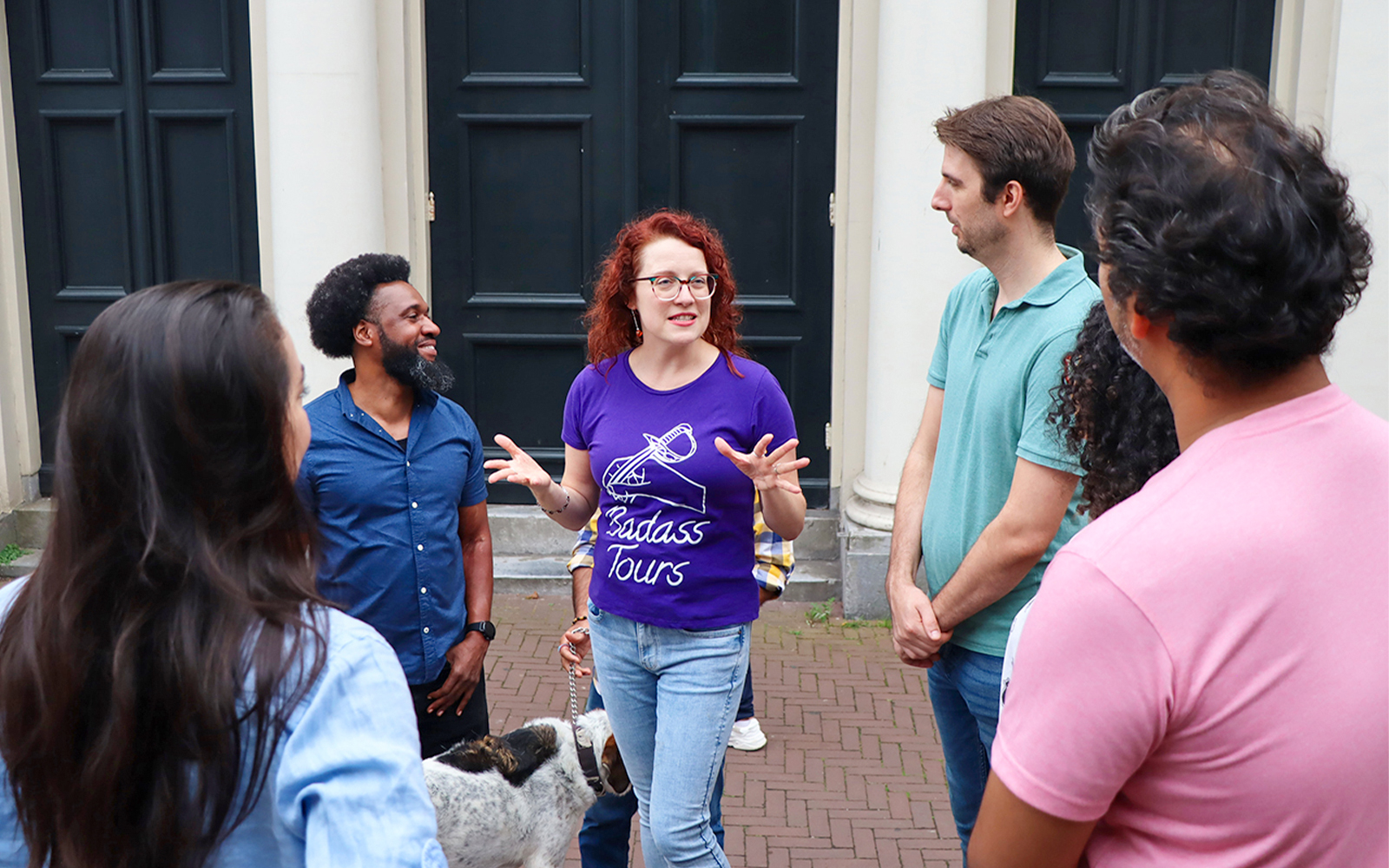 Tour guide leading a small group on a Hidden Gems Tour.